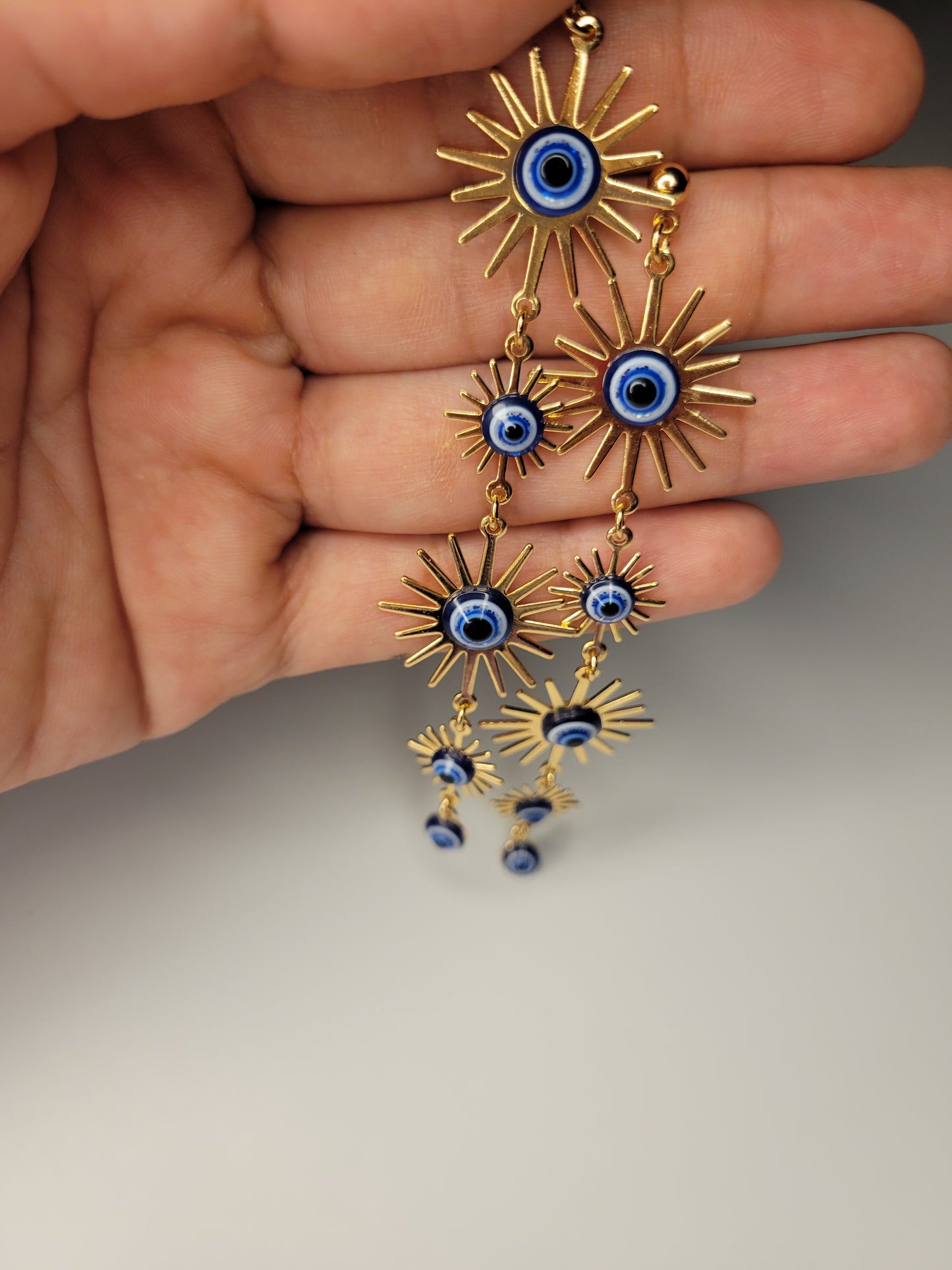 Evil eye aretes